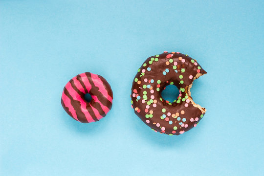 Sweet donuts on the blue background.