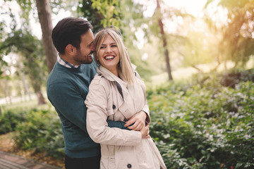 Fototapeta premium Loving couple hugging in park