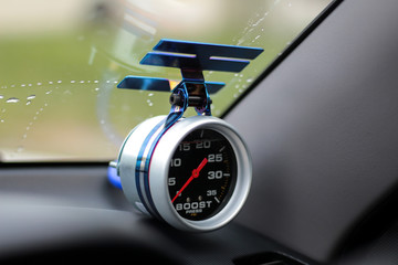 Close up of car speed meter race racing soft focus