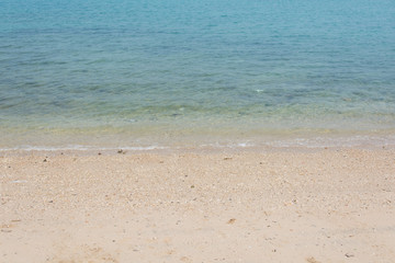 Wave of the sea on the sand beach
