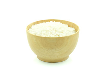 Rice in woodbowl on white background.