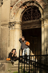 Obraz premium halloween couple with pumpkin