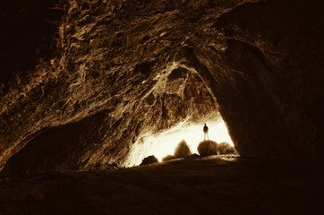 cave explorer at cave entrance