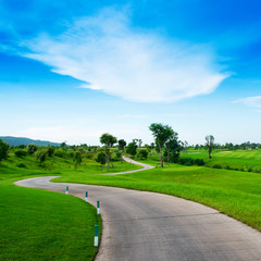 Fototapeta na wymiar concrete walk way in golf link and blue sky