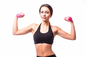 Young woman is exercising with dumbbells