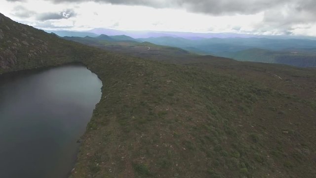 Sideways flight across Lake Esperance, Hartz Mountains National Park, Tasmania, Australia