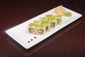 Sushi rolls on a white plate