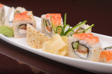 Sushi rolls on a white plate