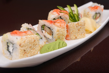 Sushi rolls on a white plate