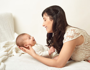 Fototapeta na wymiar mother with baby portrait, happy maternity concept