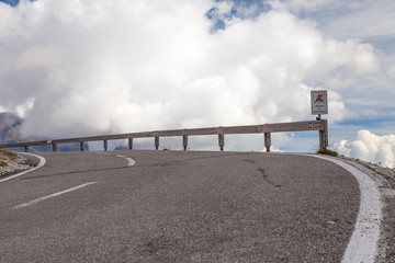 The road to the pass in the Dolomites, Italy