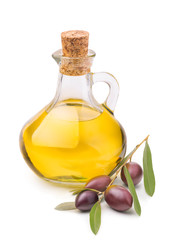 Bottle of olive oil with ripe olives branch isolated on white