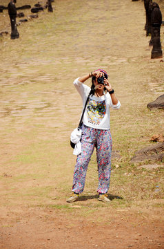 Traveler thai woman travel visit and shooting photo at archaeolo