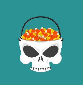 Happy halloween skull basket candy corn. Trick or treat. Sweets