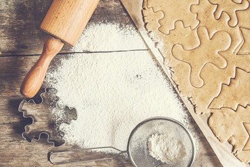 table rolled out dough, flour, Christmas shapes, style shabby in