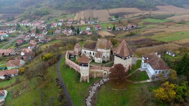 Saxon fortified church at Alma Vii Transylvania Romania. Aerial view from a drone.