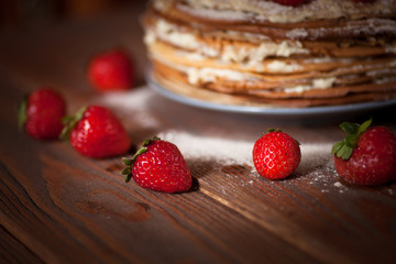 Cake of  pancakes,top view  dark brown wooden background, rustic