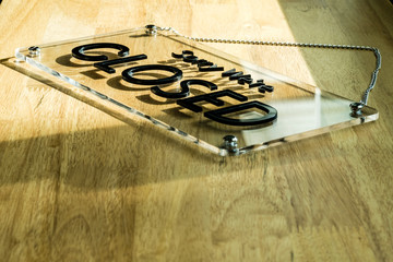 Acrylic sign with message "Sorry, we're closed"