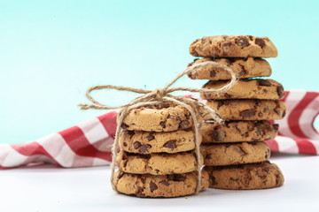 chocolate chunk cookies on a bright blue background