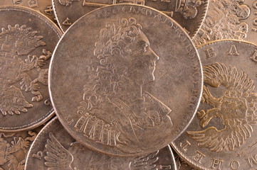 Vintage background ruble silver coin 1729 Russian emperor Peter II Autocrat of all Russia