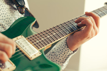 man playing electric guitar © fotofabrika