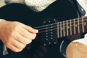 man playing electric guitar © fotofabrika
