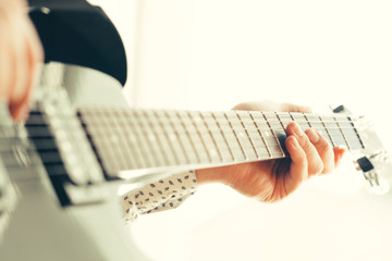 man playing electric guitar © fotofabrika