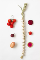 Knitted garlic, slice radish, slice beets, twig red tomatoes and