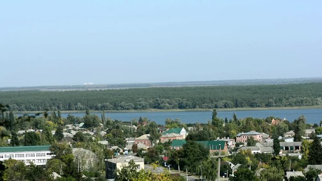 beautiful small village and the main street that runs through it. Blue lake. hills and forests surrounding the village