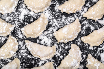 Raw dumplings background, cooking homemade