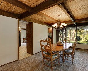 Interior of dining room in large wooden house