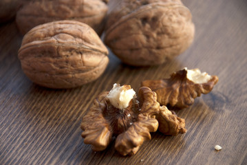 walnuts on the wooden-table.