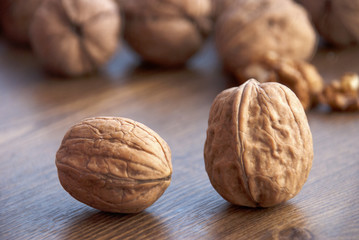 walnuts on the wooden-table.