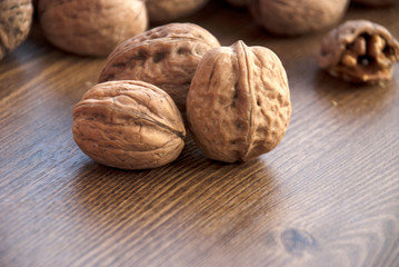 walnuts on the wooden-table.