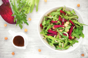 Fresh organic salad with chickpeas, beetroot and ruccola