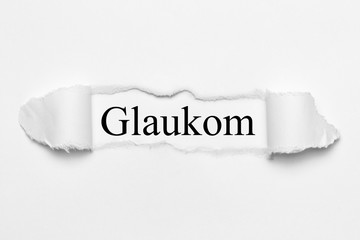 Glaukom on white torn paper