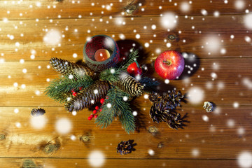 Fototapeta na wymiar christmas fir branch decoration and candle lantern