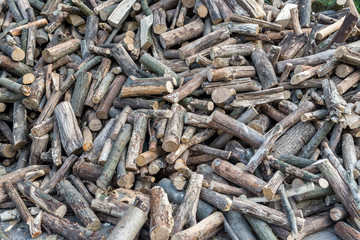Close view of mesquite wood.  image of stacked firewood.