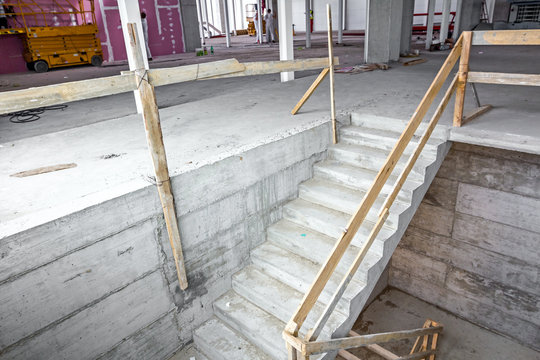 Unfinished staircase in concrete new building