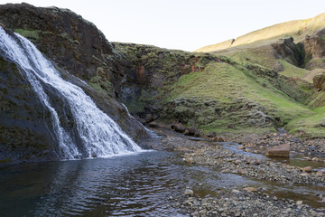 Fototapeta na wymiar One of the hundreds of wter falls in Iceland