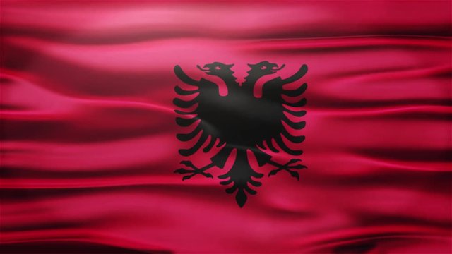 Realistic Seamless Loop Flag of Albania Waving In The Wind With Highly Detailed Fabric Texture.