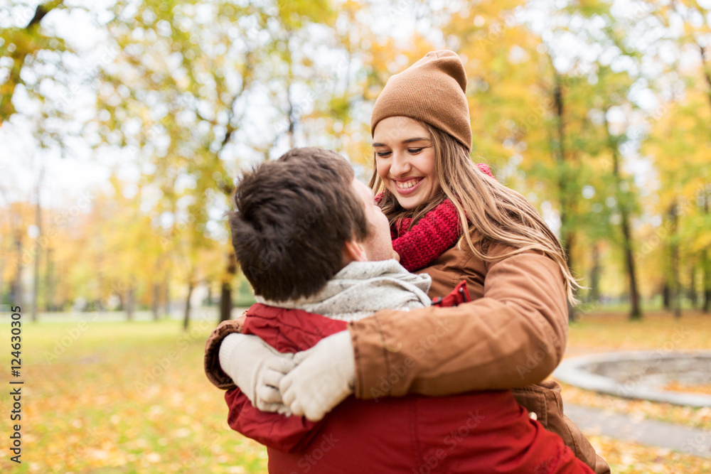 Sticker happy young couple meeting in autumn park