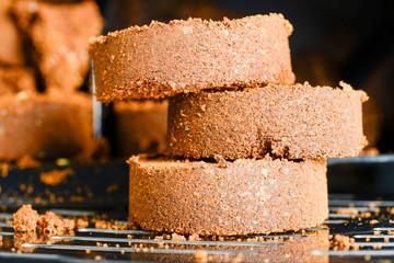 Compressed coffee grounds from the coffee machine