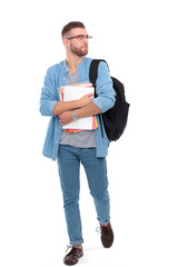 Young male student with school bag holding books isolated on white background