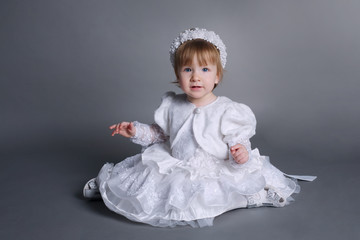 little beautiful girl in wedding dress