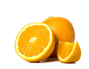 orange slices and whole on a white background