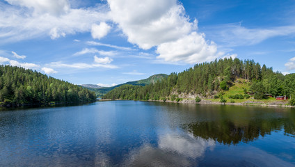Fototapeta na wymiar Typical lake landscape of Norwegian nature