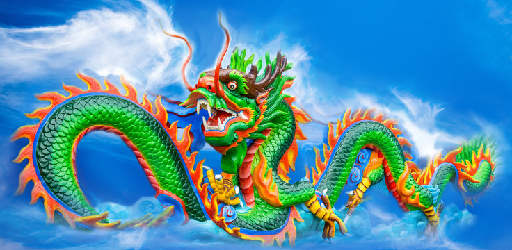Green chinese dragon with blue sky