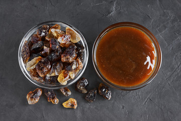 Caramelized sugar and liquid caramel in glass bowls