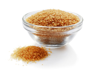 Brown cane sugar in glass bowl